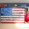 AFTER: For this flag, we used medium thick stretcher bars and a deep ebonized dark frame and the customer loved it!